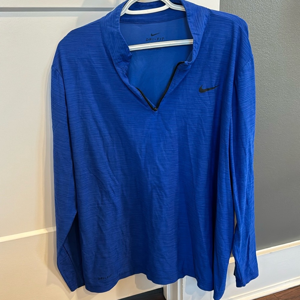 Nike. Men’s, blue, DRI FIT pullover.